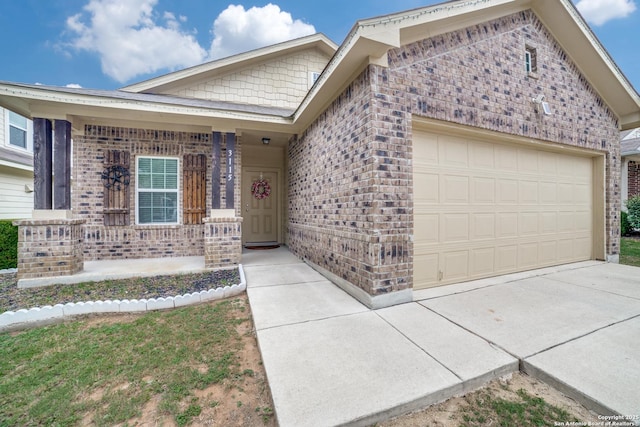 ranch-style home with covered porch and a garage