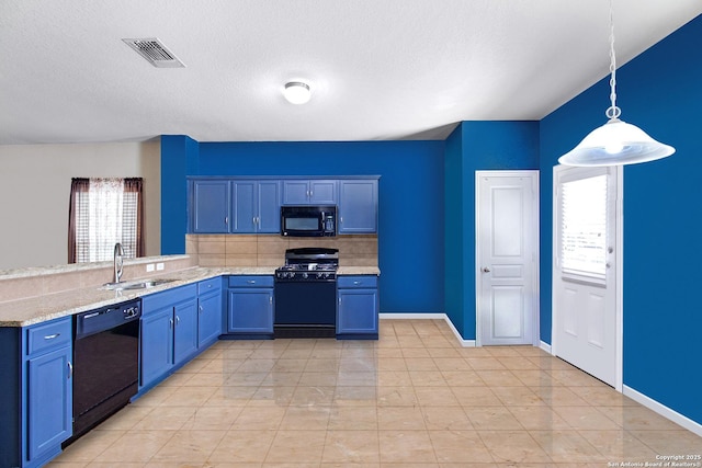 kitchen featuring black appliances, blue cabinets, sink, decorative backsplash, and decorative light fixtures