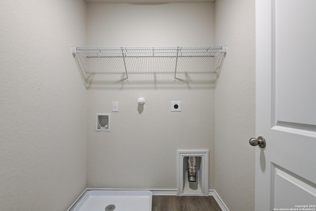 clothes washing area with electric dryer hookup, dark hardwood / wood-style floors, gas dryer hookup, and hookup for a washing machine