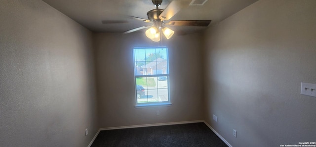 unfurnished room with ceiling fan