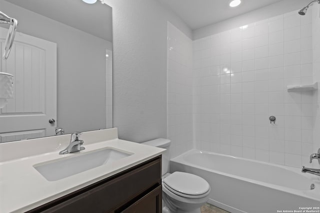 full bathroom with washtub / shower combination, vanity, and toilet