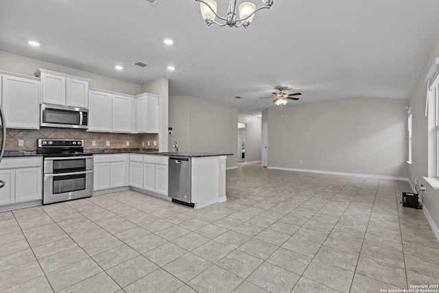 kitchen featuring ceiling fan with notable chandelier, light tile patterned flooring, white cabinetry, and appliances with stainless steel finishes