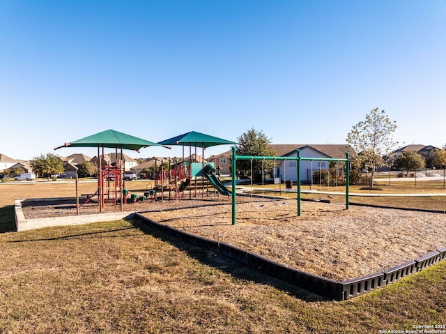 view of play area featuring a lawn