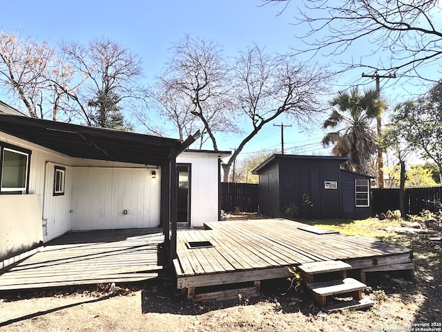 wooden deck with a storage unit