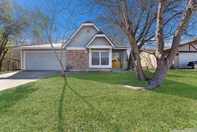 view of front of house with a garage and a front lawn