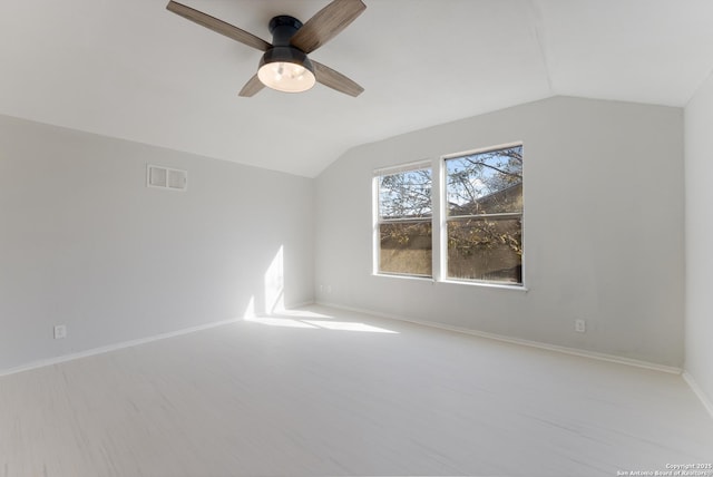 interior space with ceiling fan and lofted ceiling