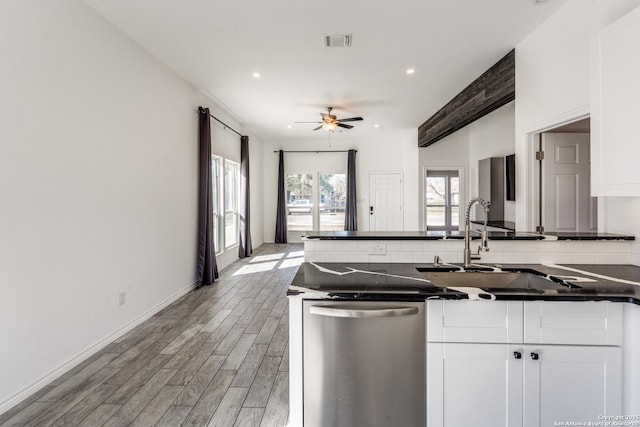 kitchen with dishwasher, sink, ceiling fan, light wood-type flooring, and white cabinetry