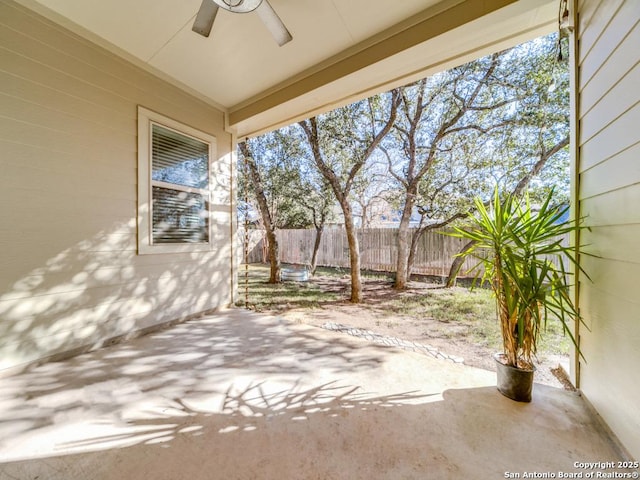 view of patio featuring ceiling fan