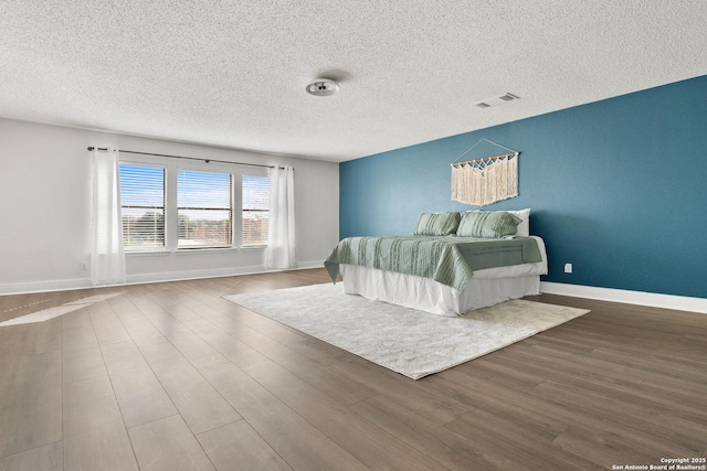 unfurnished bedroom with a textured ceiling