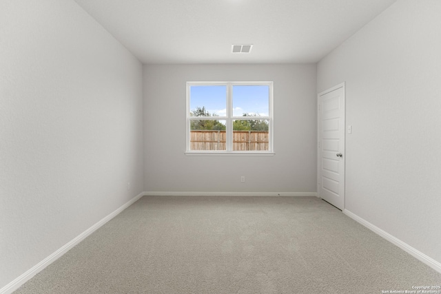 empty room featuring carpet