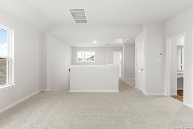 empty room featuring light colored carpet