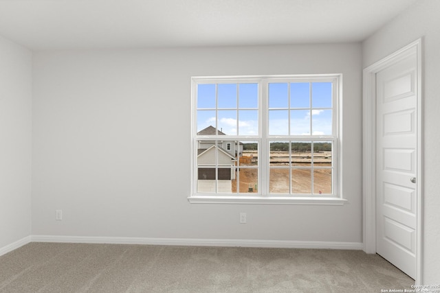 empty room featuring carpet floors