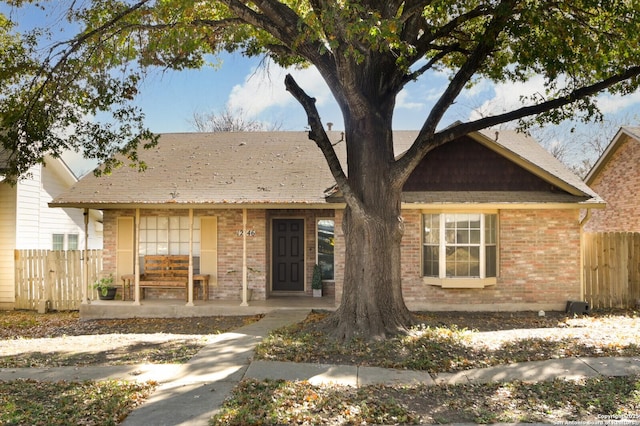 ranch-style home with a porch