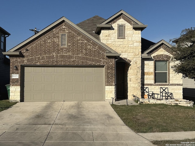 view of front of home with a garage