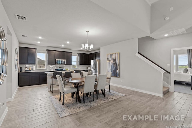 dining room with an inviting chandelier