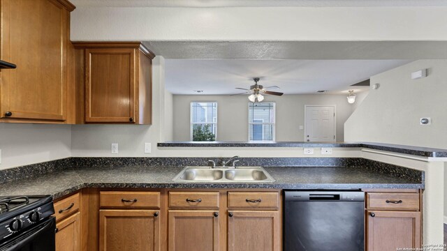 kitchen with kitchen peninsula, sink, ceiling fan, and black appliances