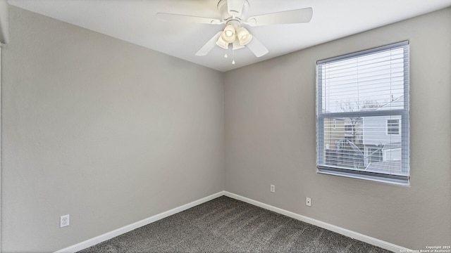 carpeted empty room featuring ceiling fan