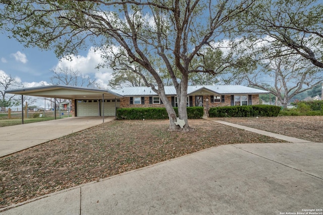 ranch-style home featuring a carport