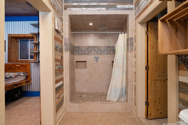 bathroom featuring a shower with shower curtain and tile patterned floors