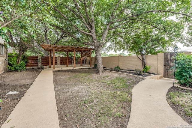 view of yard with a pergola