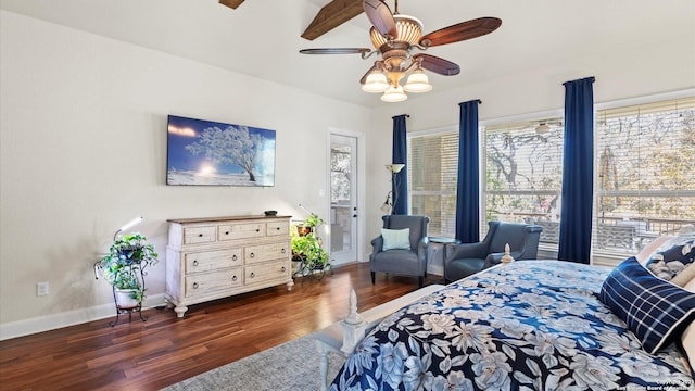 bedroom featuring dark hardwood / wood-style floors and ceiling fan