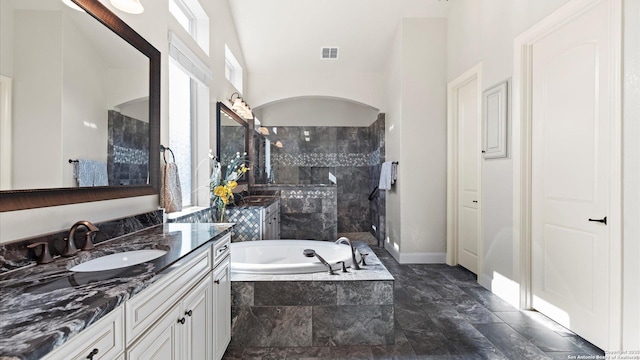 bathroom with plus walk in shower and vanity