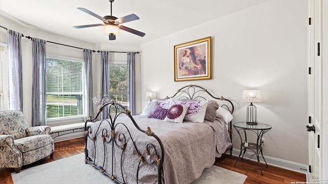 bedroom featuring wood-type flooring and ceiling fan