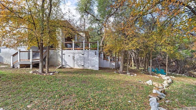 view of yard featuring a deck