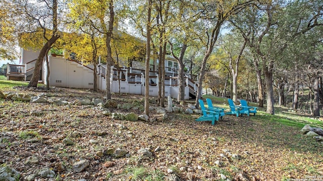 view of yard with a wooden deck