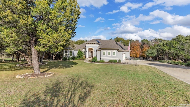 view of front of home with a front yard