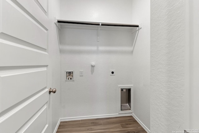 clothes washing area featuring hookup for a gas dryer, hookup for a washing machine, dark hardwood / wood-style floors, and hookup for an electric dryer