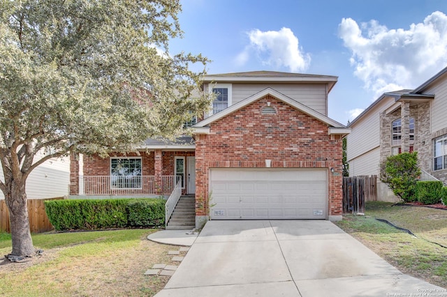 view of property with a front lawn and a garage