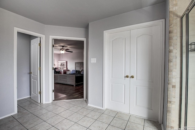 unfurnished bedroom featuring light tile patterned flooring