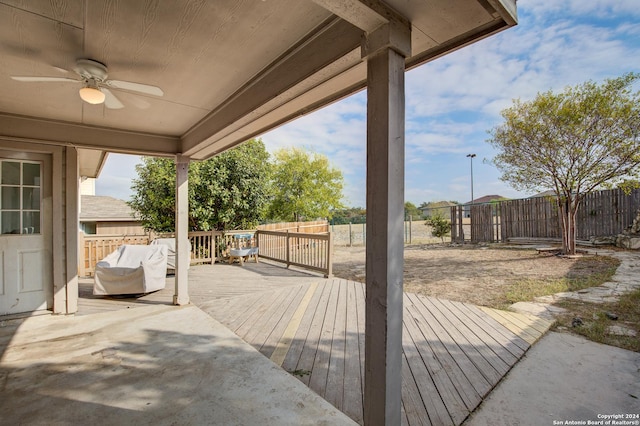 view of patio with a wooden deck and ceiling fan