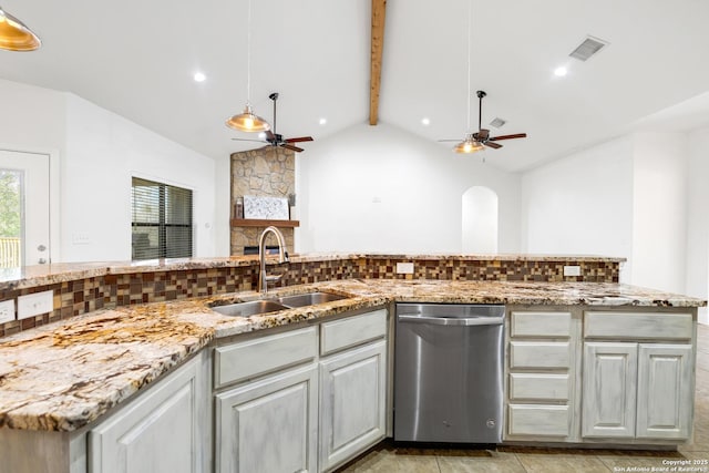 kitchen with backsplash, sink, beamed ceiling, and stainless steel dishwasher