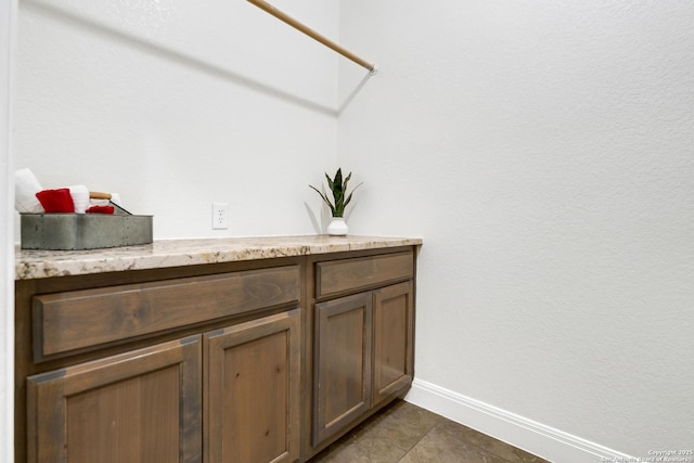 bathroom with tile patterned floors