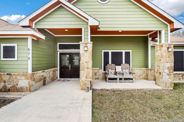 entrance to property with french doors