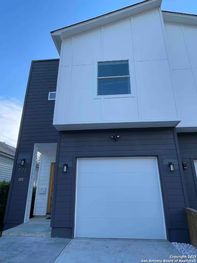 exterior space with a garage