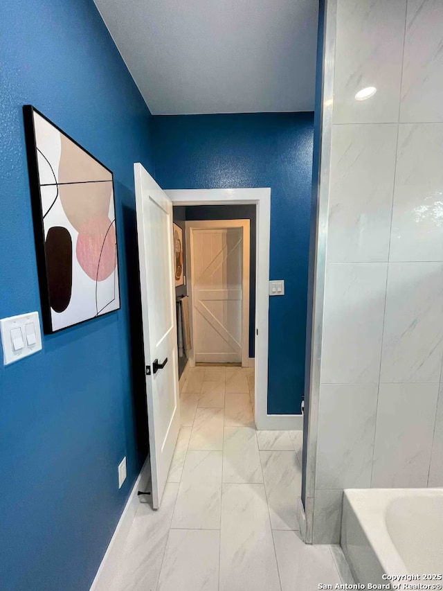 bathroom featuring a bathing tub