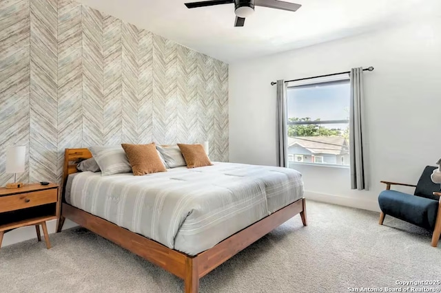 bedroom featuring ceiling fan and carpet floors