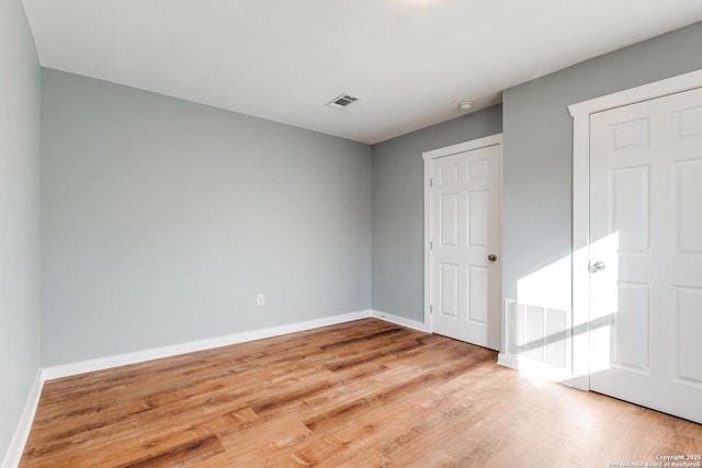 unfurnished bedroom featuring light hardwood / wood-style flooring