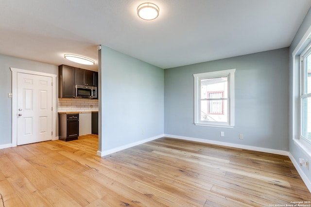 empty room featuring light hardwood / wood-style floors