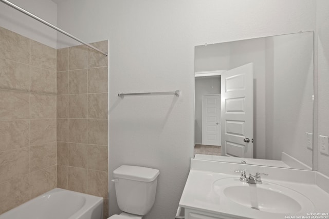 4906 Sandstone Way, San Antonio, TX 78222 - full bathroom featuring vanity, tiled shower / bath combo, and toilet