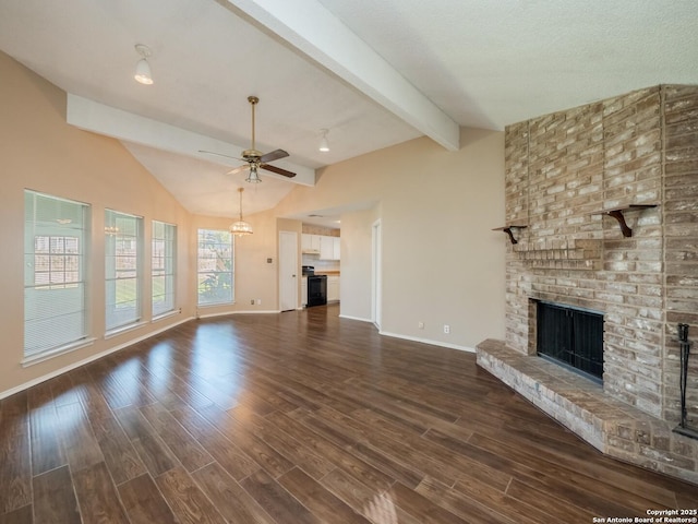 unfurnished living room featuring vaulted ceiling with beams, ceiling fan, dark hardwood / wood-style floors, and a brick fireplace