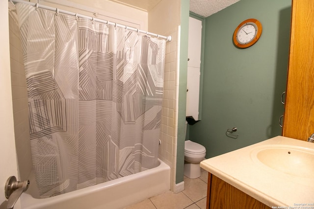 full bathroom featuring shower / bathtub combination with curtain, tile patterned floors, a textured ceiling, toilet, and vanity