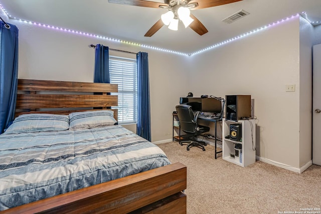 carpeted bedroom with ceiling fan