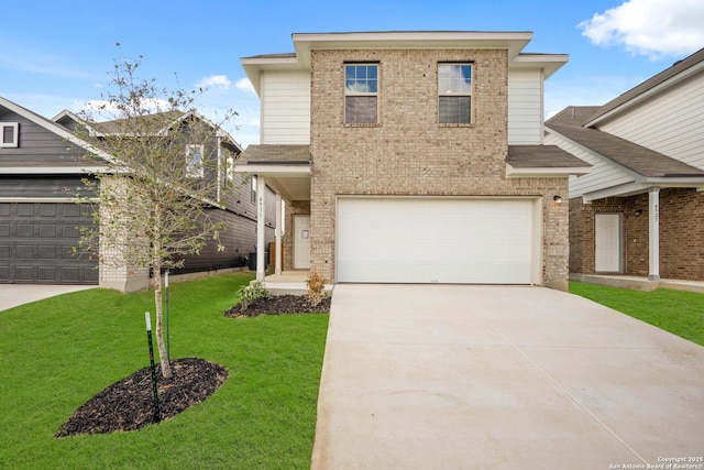 view of front of home with a front lawn and a garage