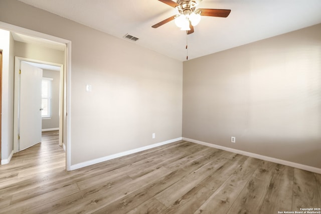 spare room with ceiling fan and light hardwood / wood-style flooring