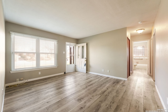 empty room featuring light hardwood / wood-style flooring