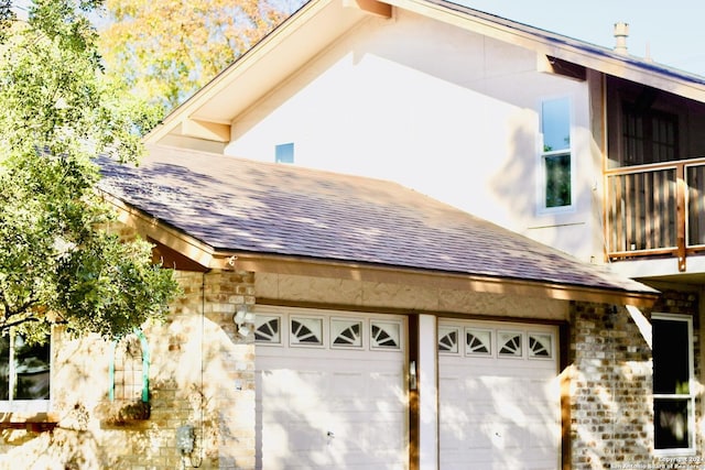 view of property exterior with a garage